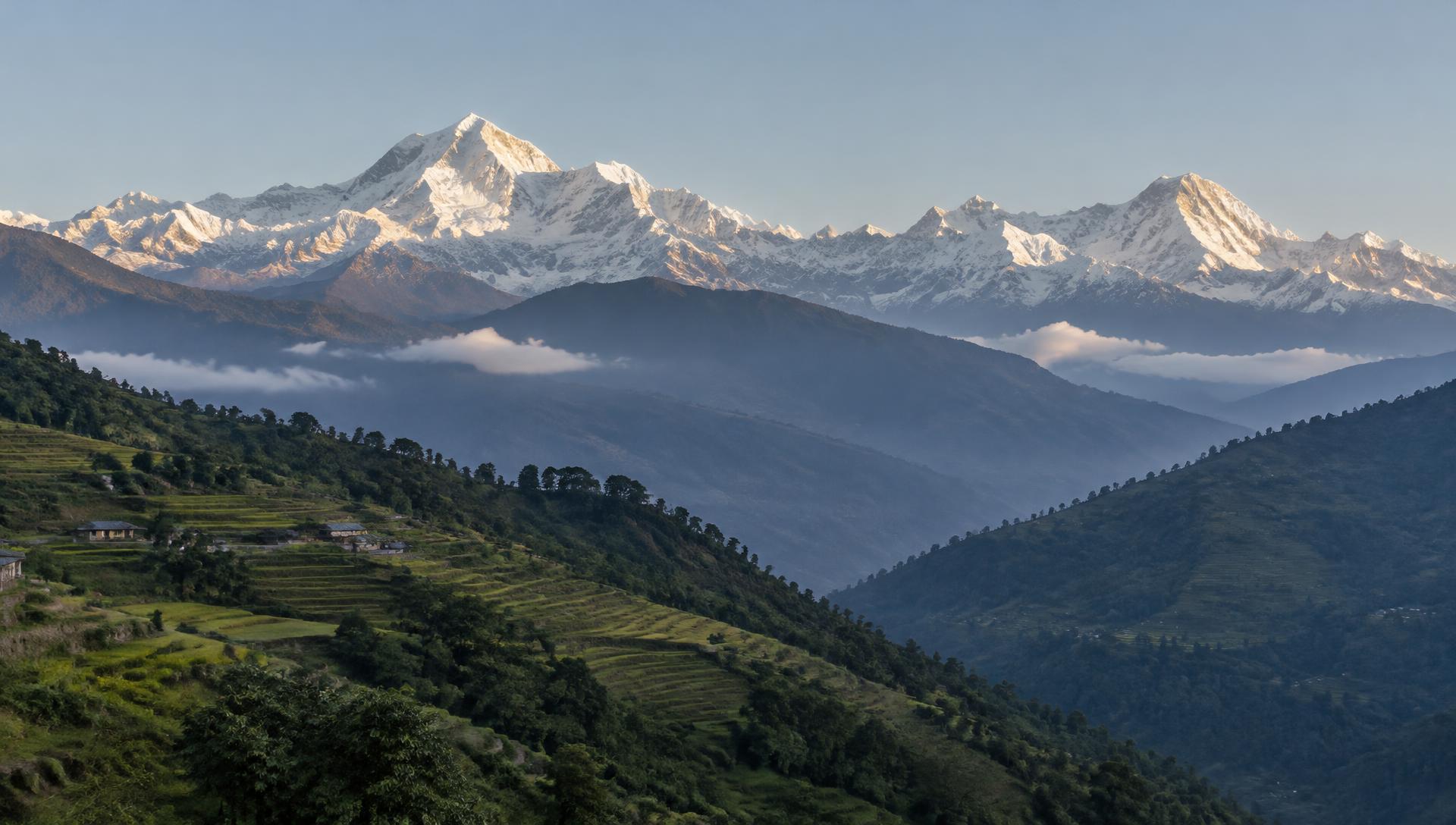 Himalayan peaks above terraced hills in Nepal